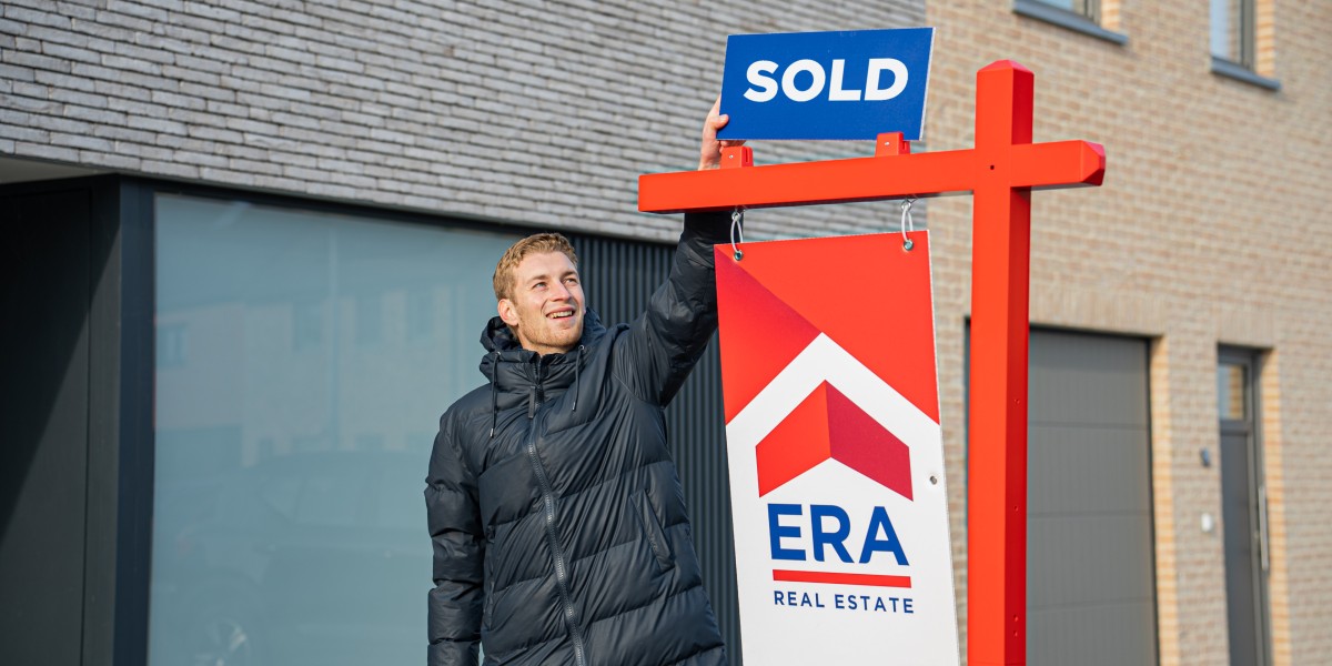ERA estate agent with sold sign